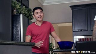 Kianna Dior is on her knees cleaning the floor with a sponge