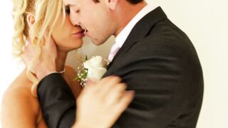 Sexy bride Tasha Reign kissing on her own wedding