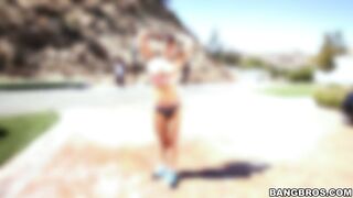 Lisa Ann showing off her goods outdoors