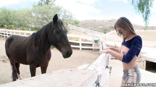 Callie Calypso posing in front of her horse