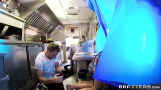 Marsha May tries to keep a straight face serving customers