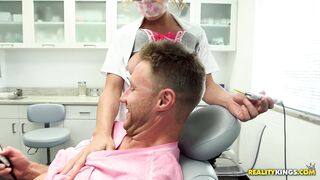 Buxom nurse Corinna Blake pushes her tits into his face