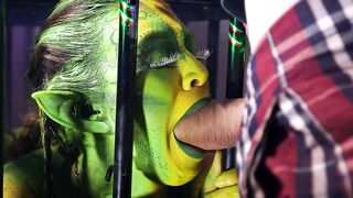 Eva Parcker and Tiffany Doll suck cock between the bars of a cage