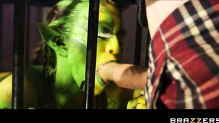 Eva Parcker and Tiffany Doll suck cock between the bars of a cage